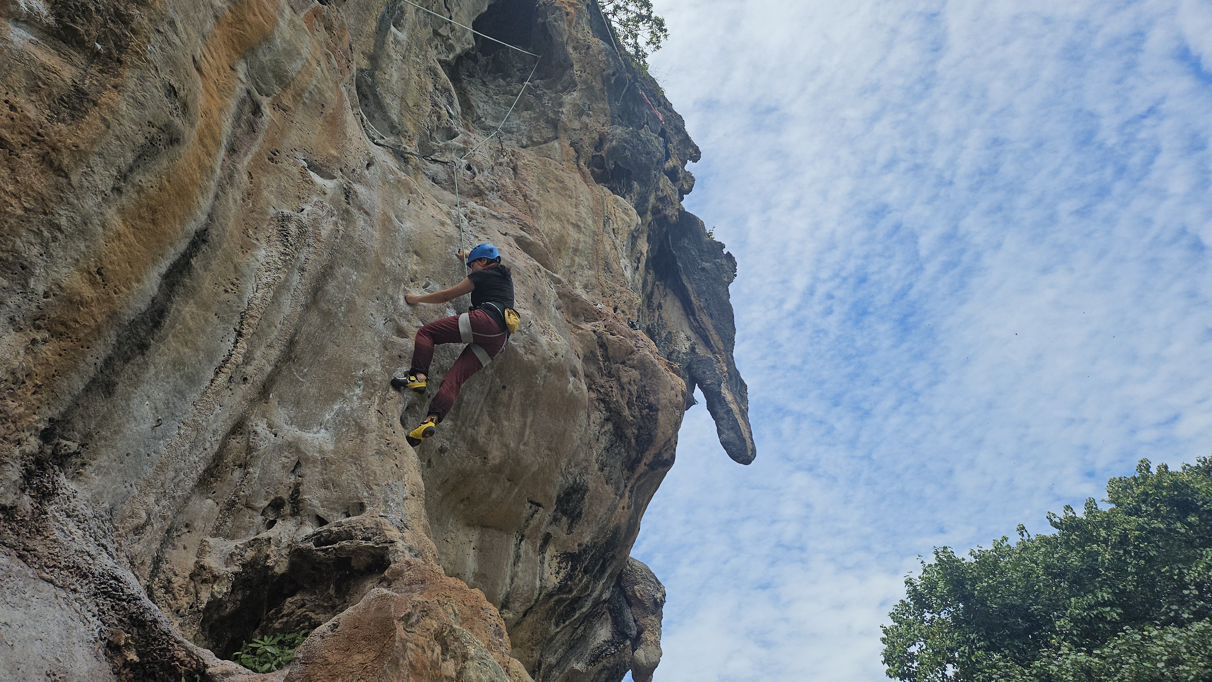 Yasha rock climbing